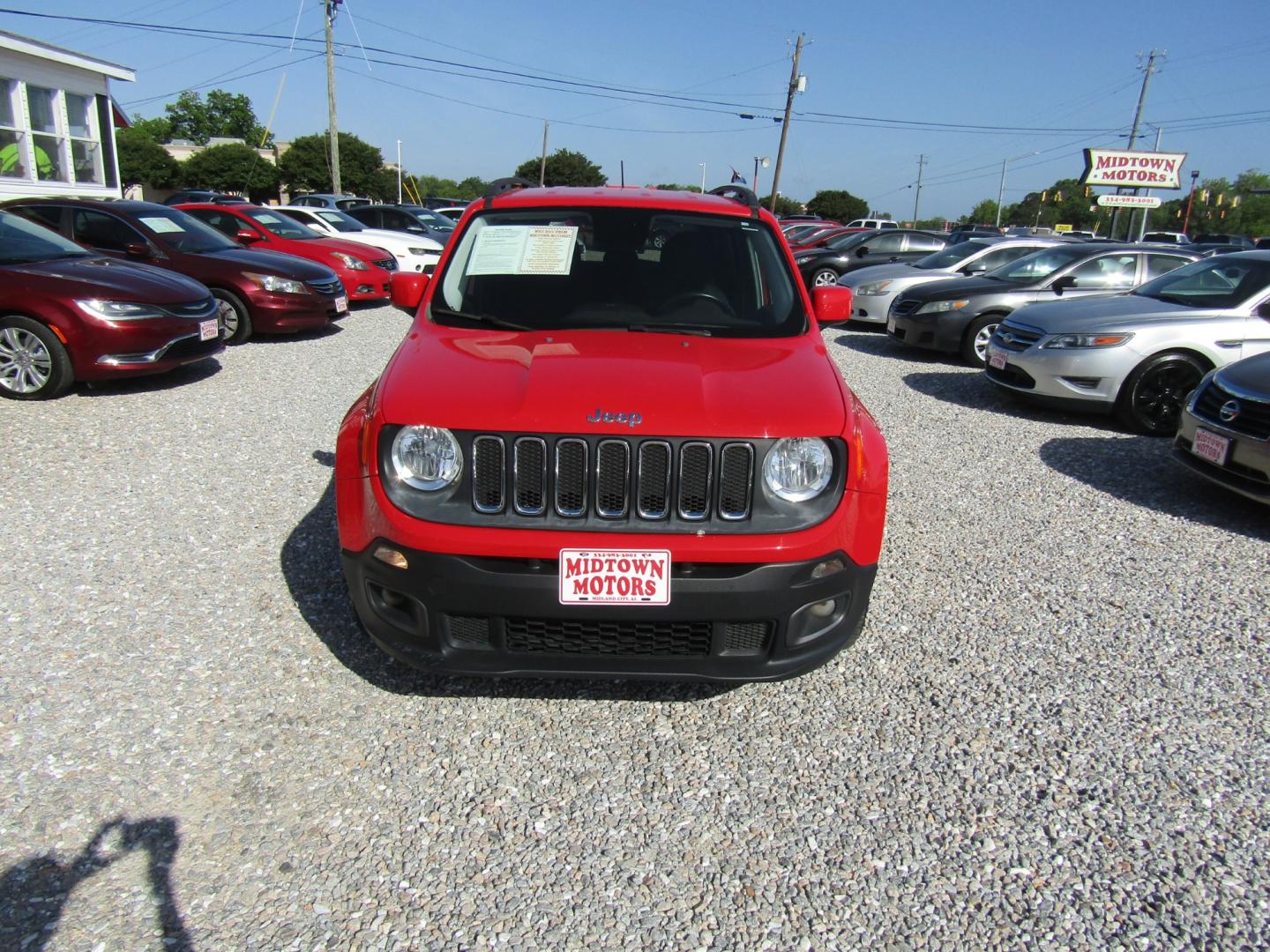 2016 Red /Gray Jeep Renegade Latitude FWD (ZACCJABT0GP) with an 2.4L L4 DOHC 16V engine, Automatic transmission, located at 15016 S Hwy 231, Midland City, AL, 36350, (334) 983-3001, 31.306210, -85.495277 - Photo#1